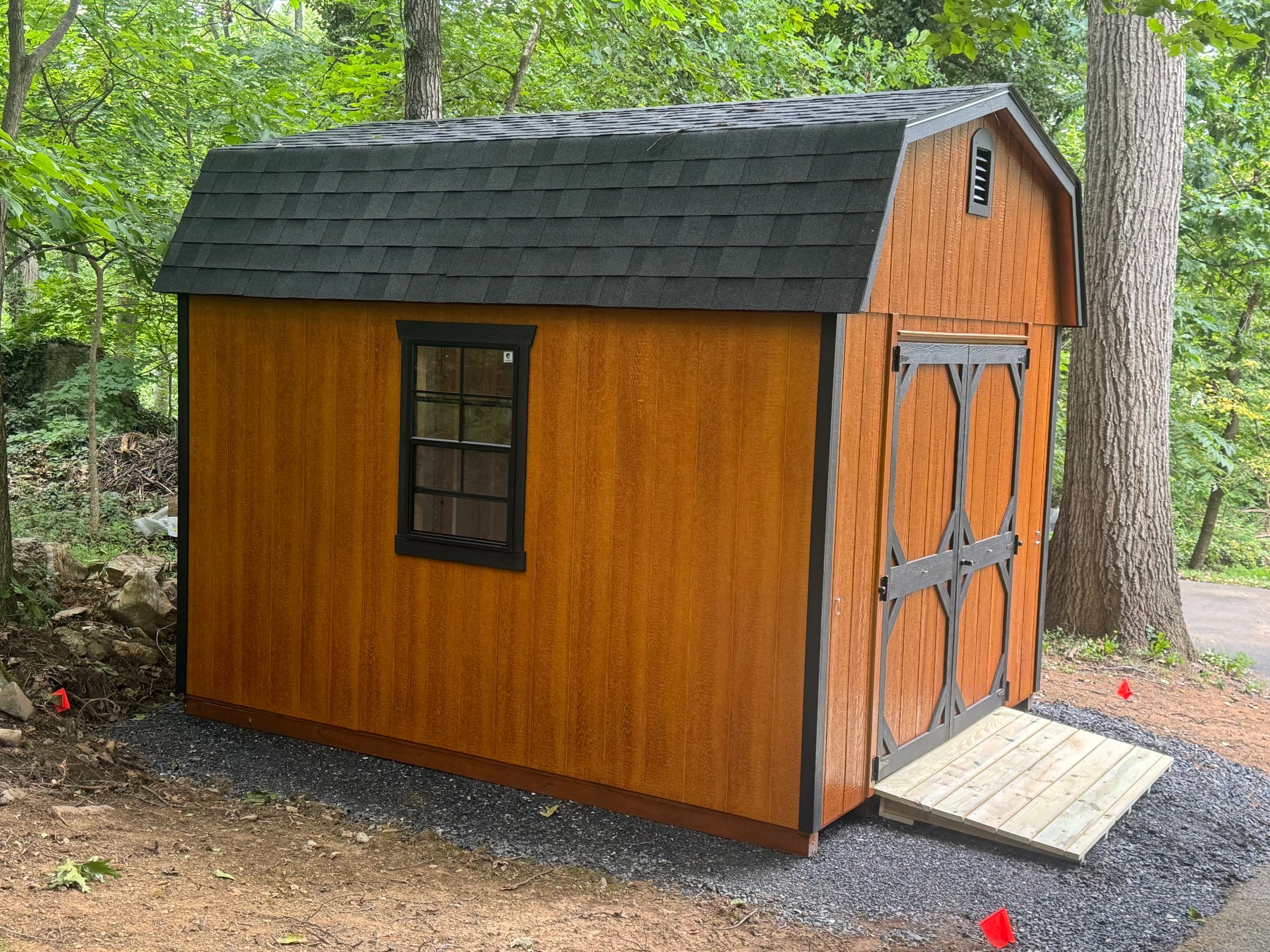 A Cedar Barn Shed Gives Kenny & Lisa's Garage Room to Breathe in Winchester